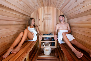Gladstone Outdoor Sauna interior with couple relaxing